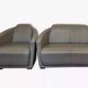 Two-seater sofa and a grey leather armchair Italia.