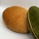 Pair of vintage round velvet cushions