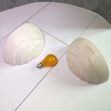 Wall sconces in stone and in the shape of a basin