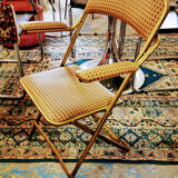 Folding gold arm chair