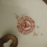 Pair of vintage Chinese decorative plates with floral decoration on a yellow background