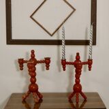 Pair of red wooden candelabra from Sweden 1970