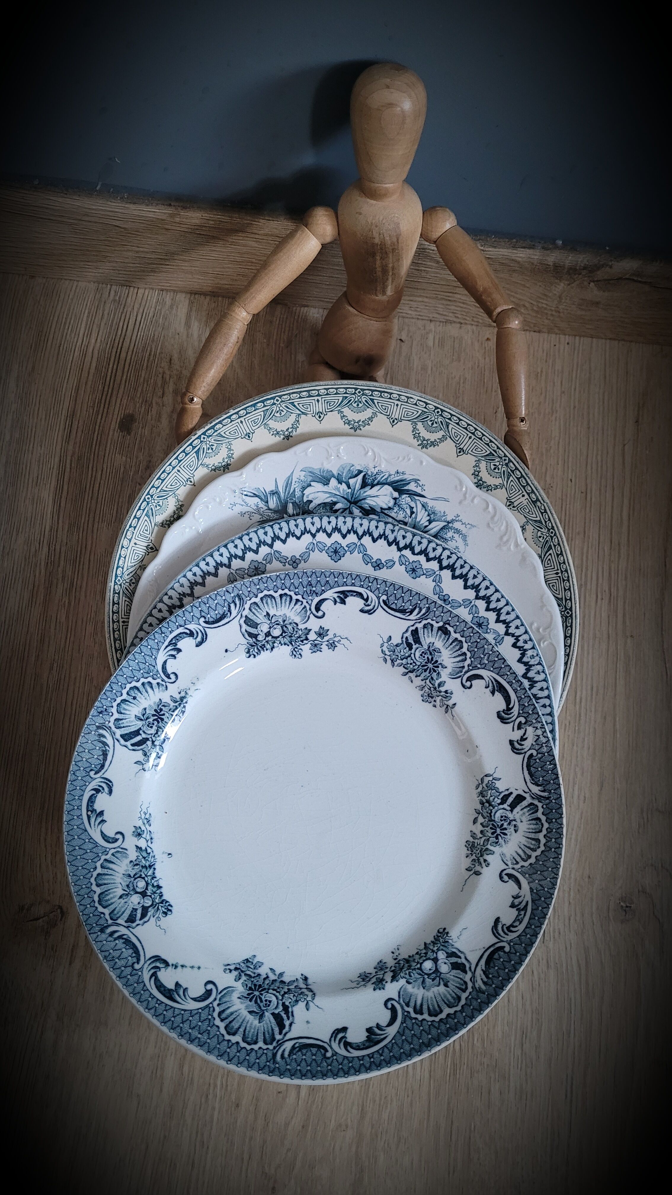 Quartet of mismatched blue plates