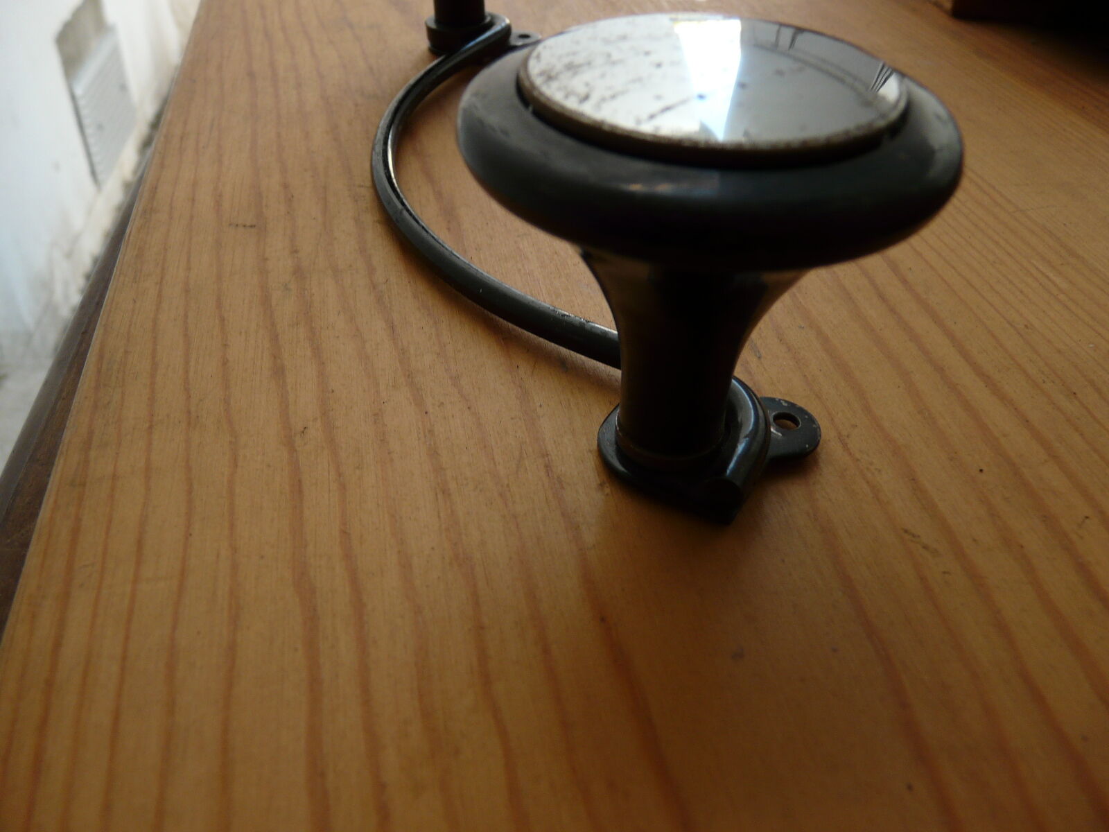 Metal coat holder with two pads