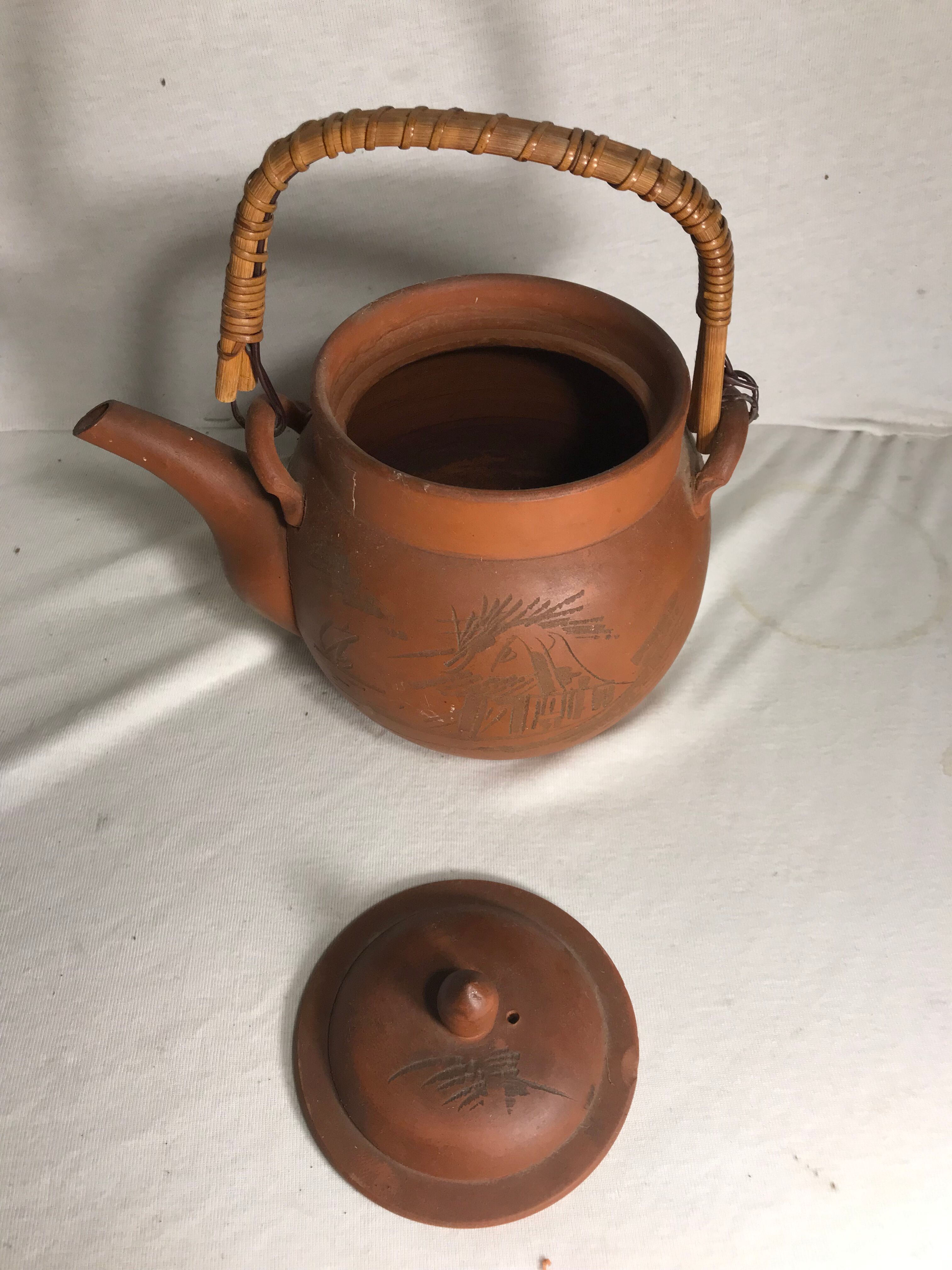Antique terracotta teapot