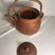 Antique terracotta teapot