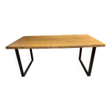 Solid wood table made by a craftsman.