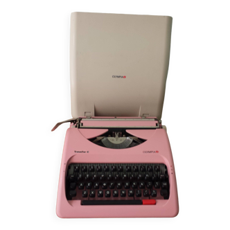 Typewriter, manual portable with pink carrying case