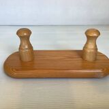 Small wooden coat rack with two hooks
