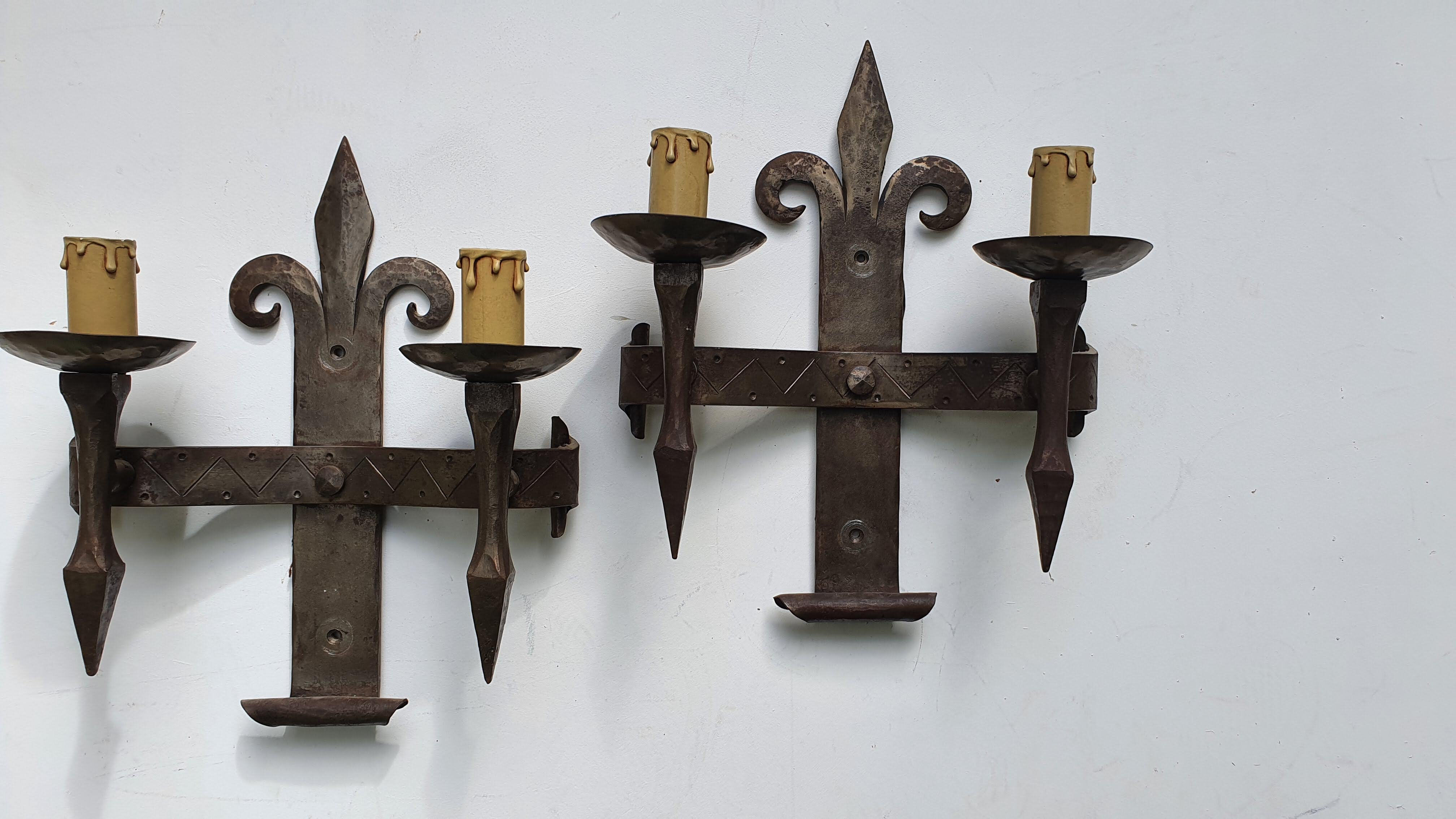 Duo of wrought iron wall lamps Atelier Marolles