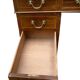 Antique English walnut chest of drawers from the 1930s.