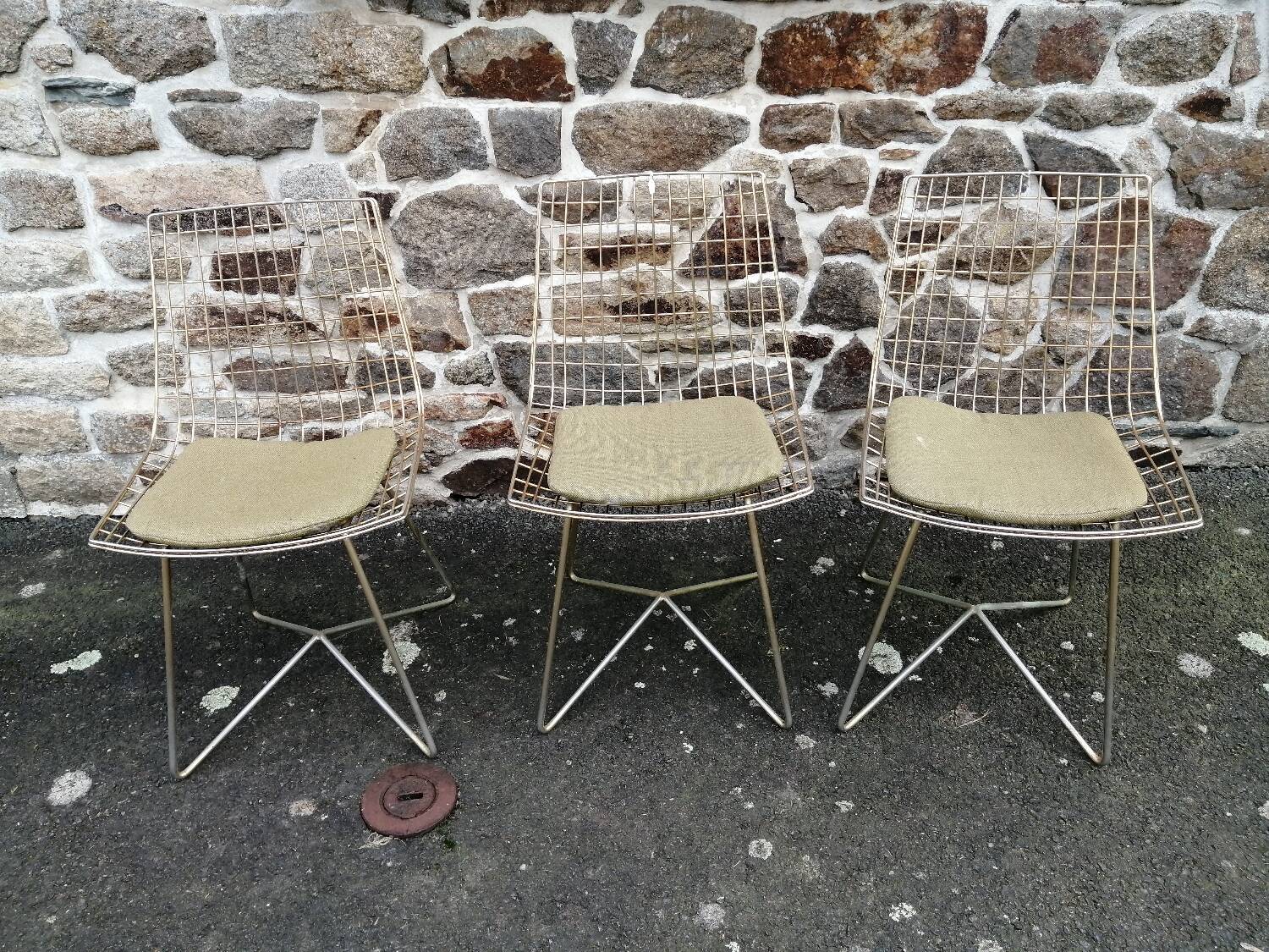 Three chairs in the style of Harry Bertoia