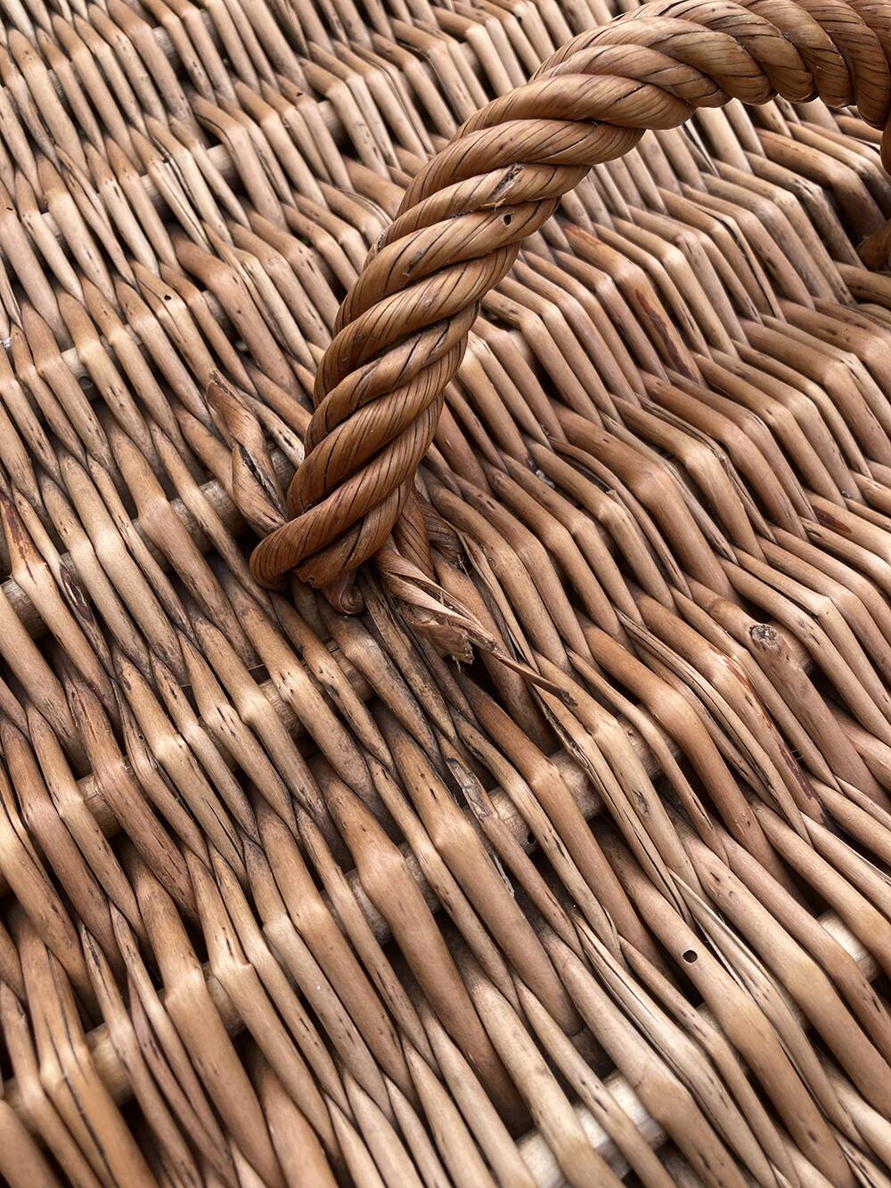 Old wicker basket with closure and handle