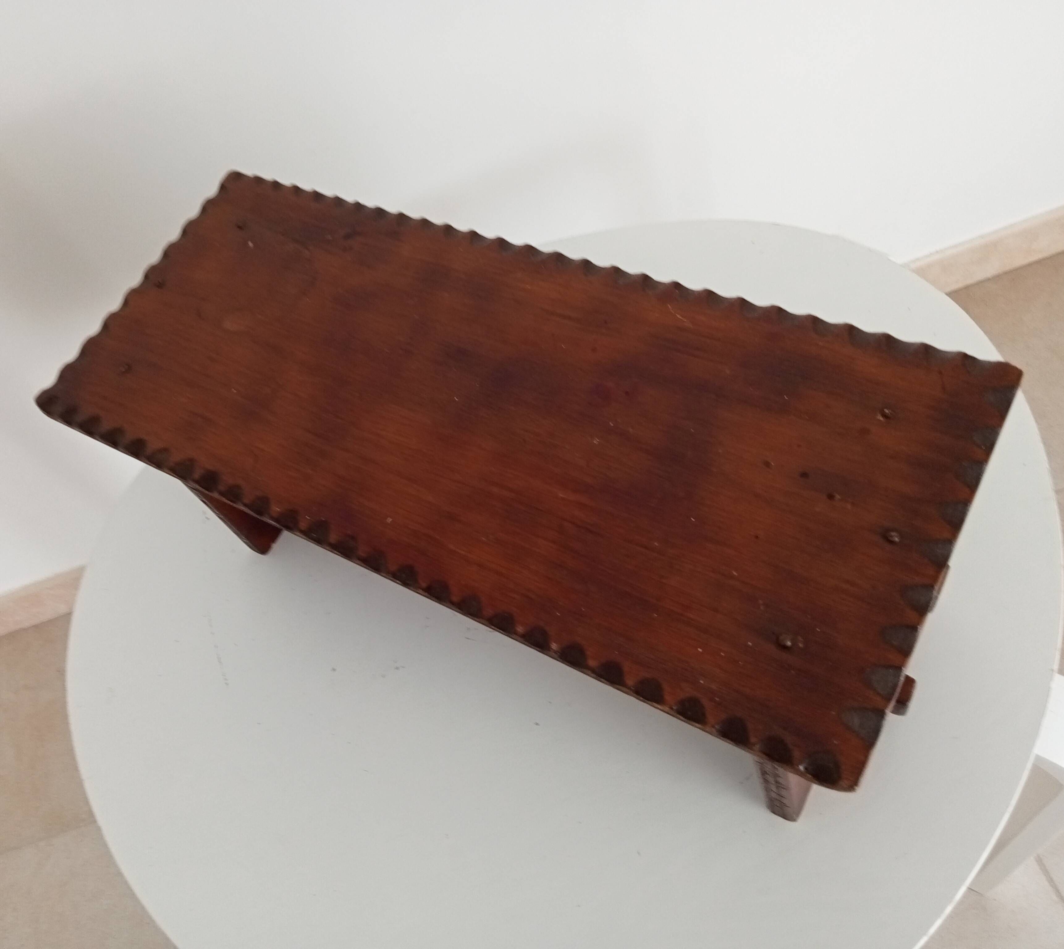 Low brutalist stool in the style of Charles Dudouyt.