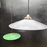 Suspensions in enamelled sheets