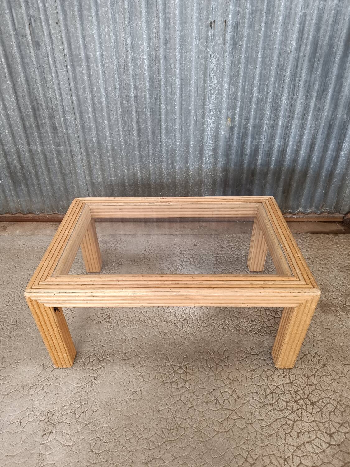 Glass coffee table in rattan/bamboo