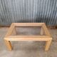 Glass coffee table in rattan/bamboo