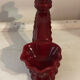 Ruby red ceramic pocket ashtray from Vallauris, numbered.