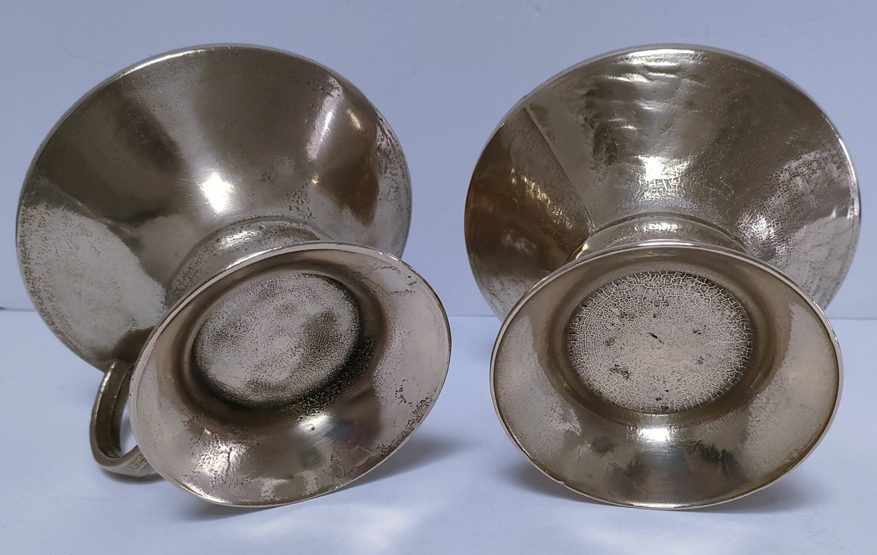 Pair of vintage solid brass hand candlesticks