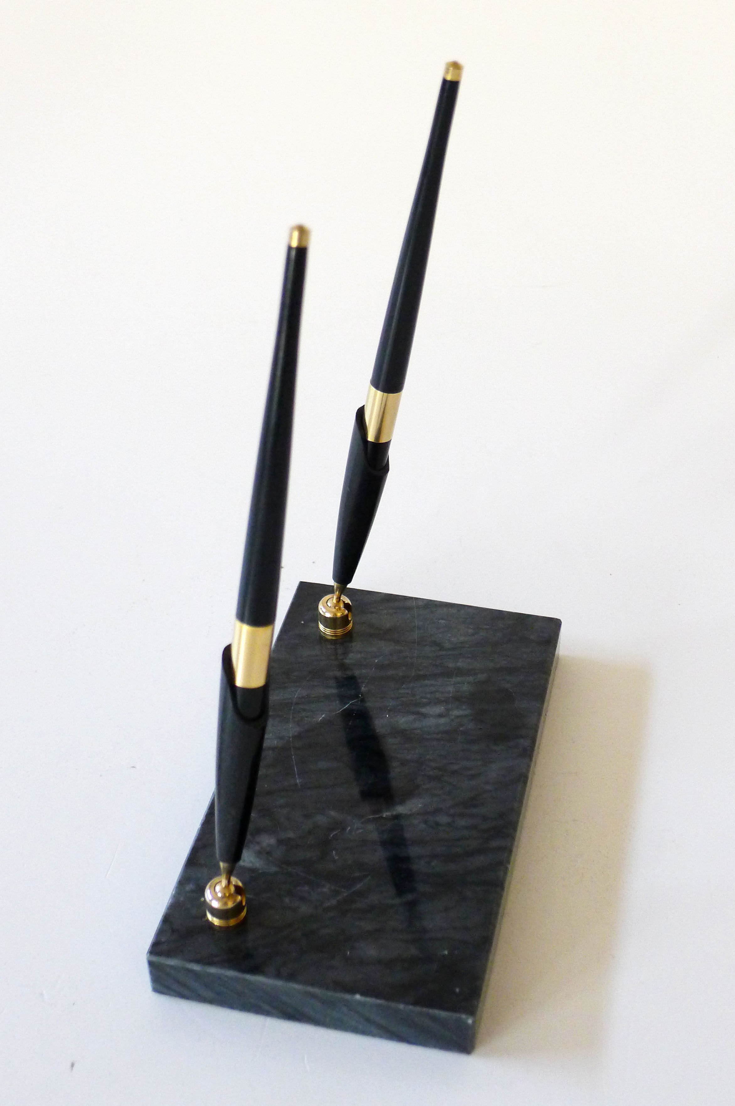 Pen doors on marble base