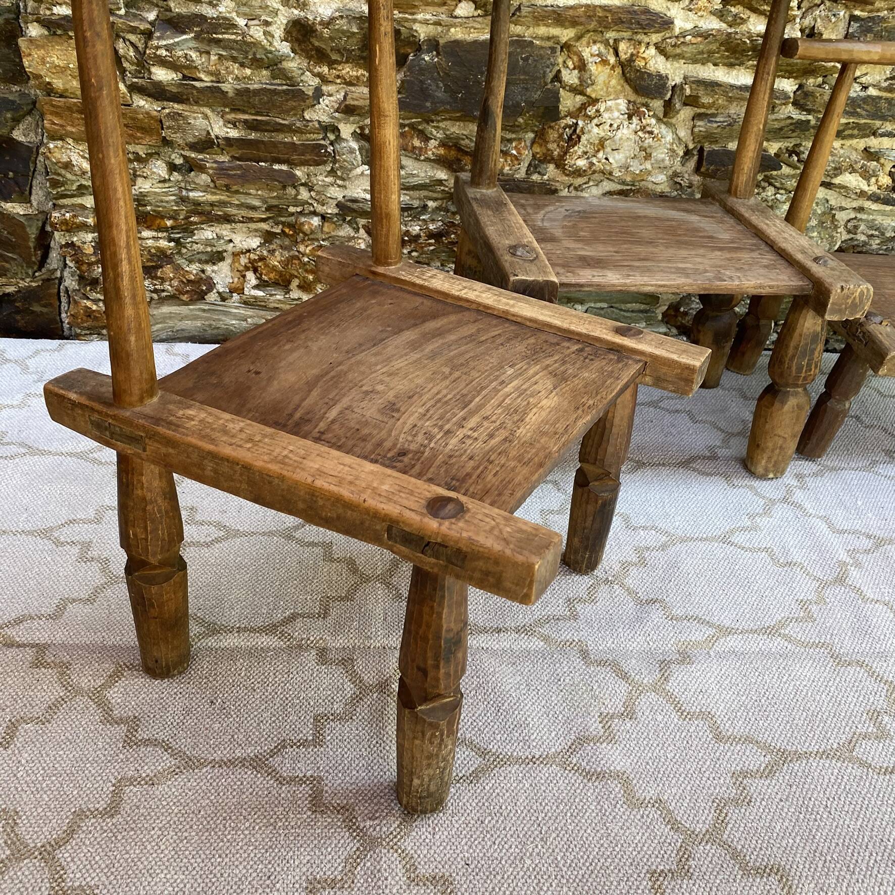 Ancient Baoulé African chairs in carved wood, Wabi-Sabi.