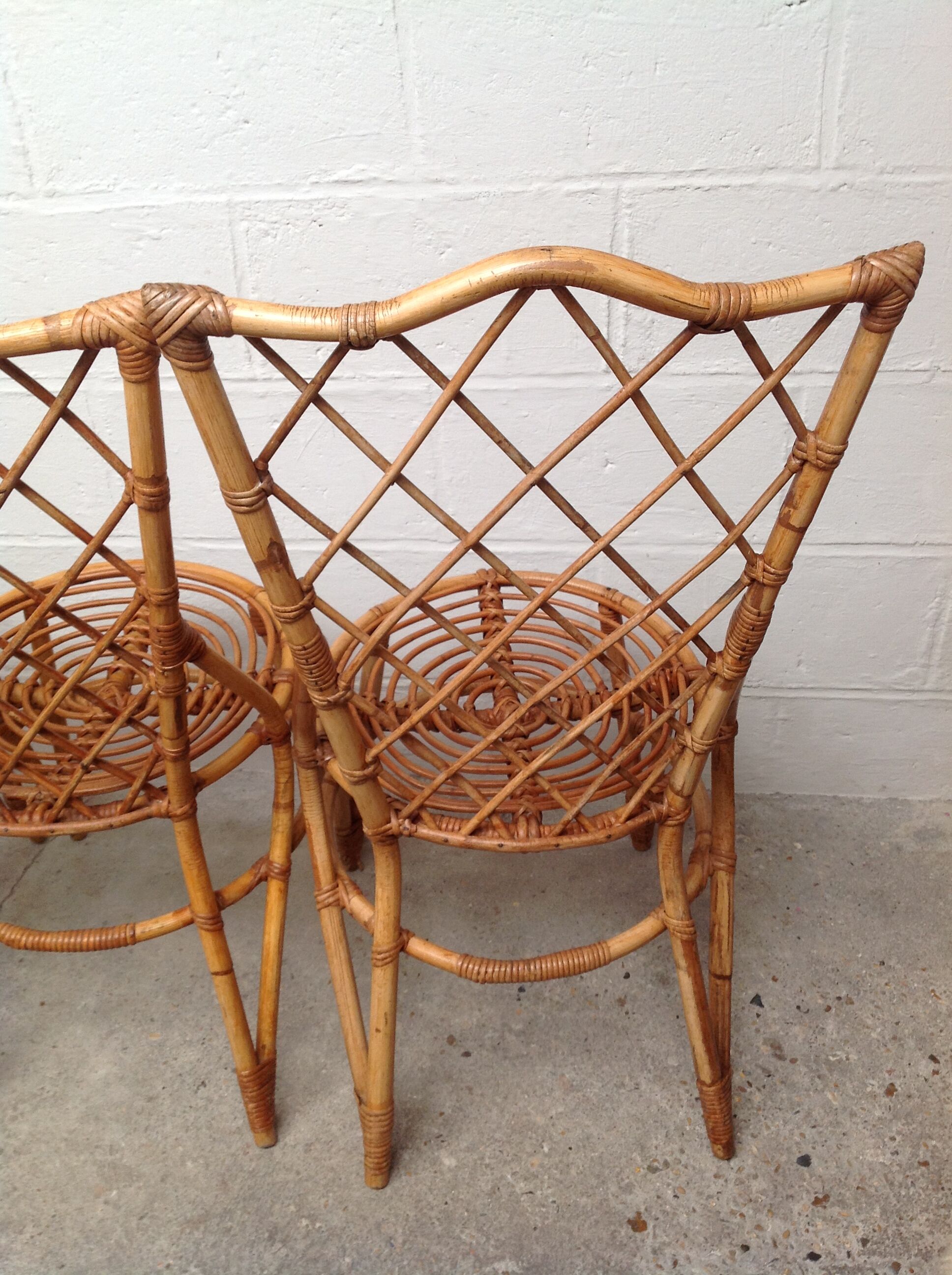 Rattan chairs by Louis Sognot