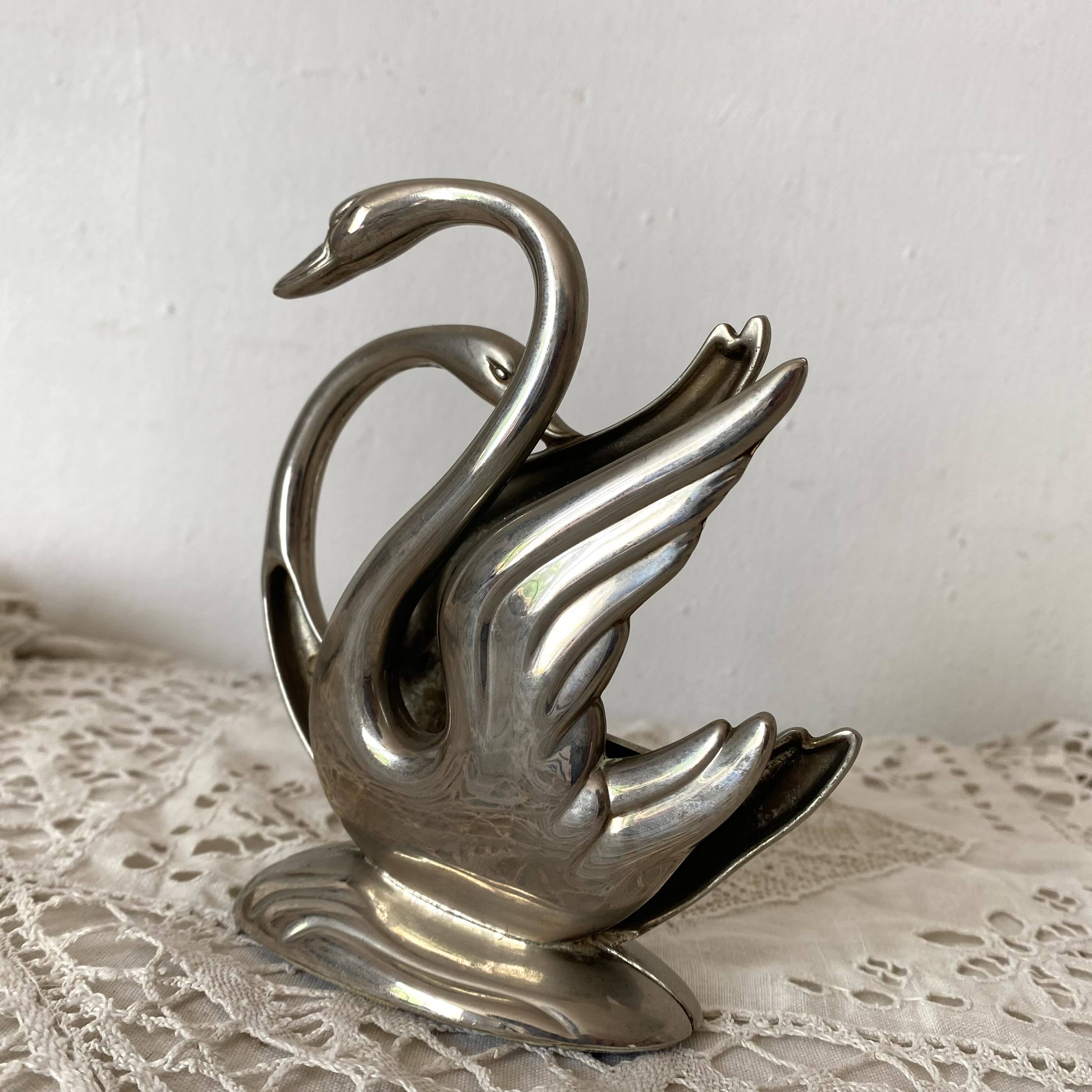 Zoomorphic letter holder, swans
