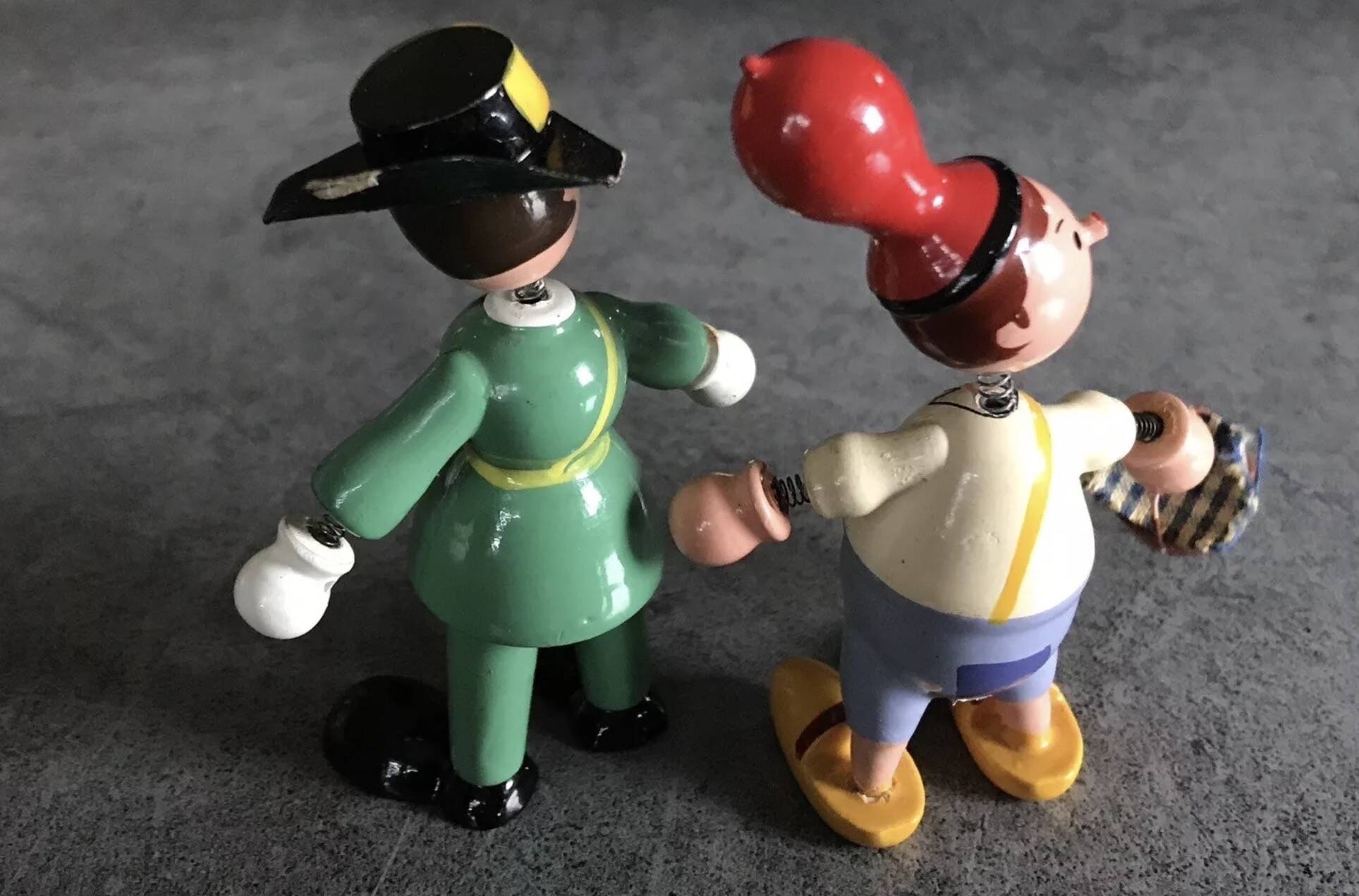 Set of 2 vintage GOULA wooden toy figurines with spring.