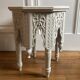 Oriental tea table or pedestal table forming a side table in solid carved and white lacquered wood