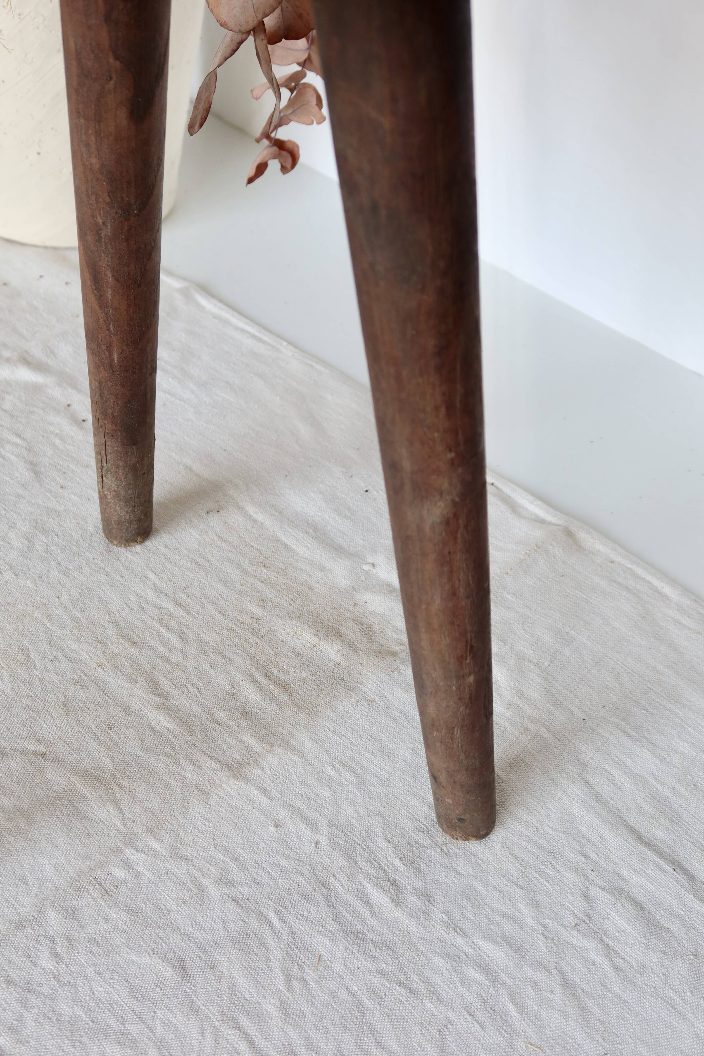 Vintage wooden tripod stool