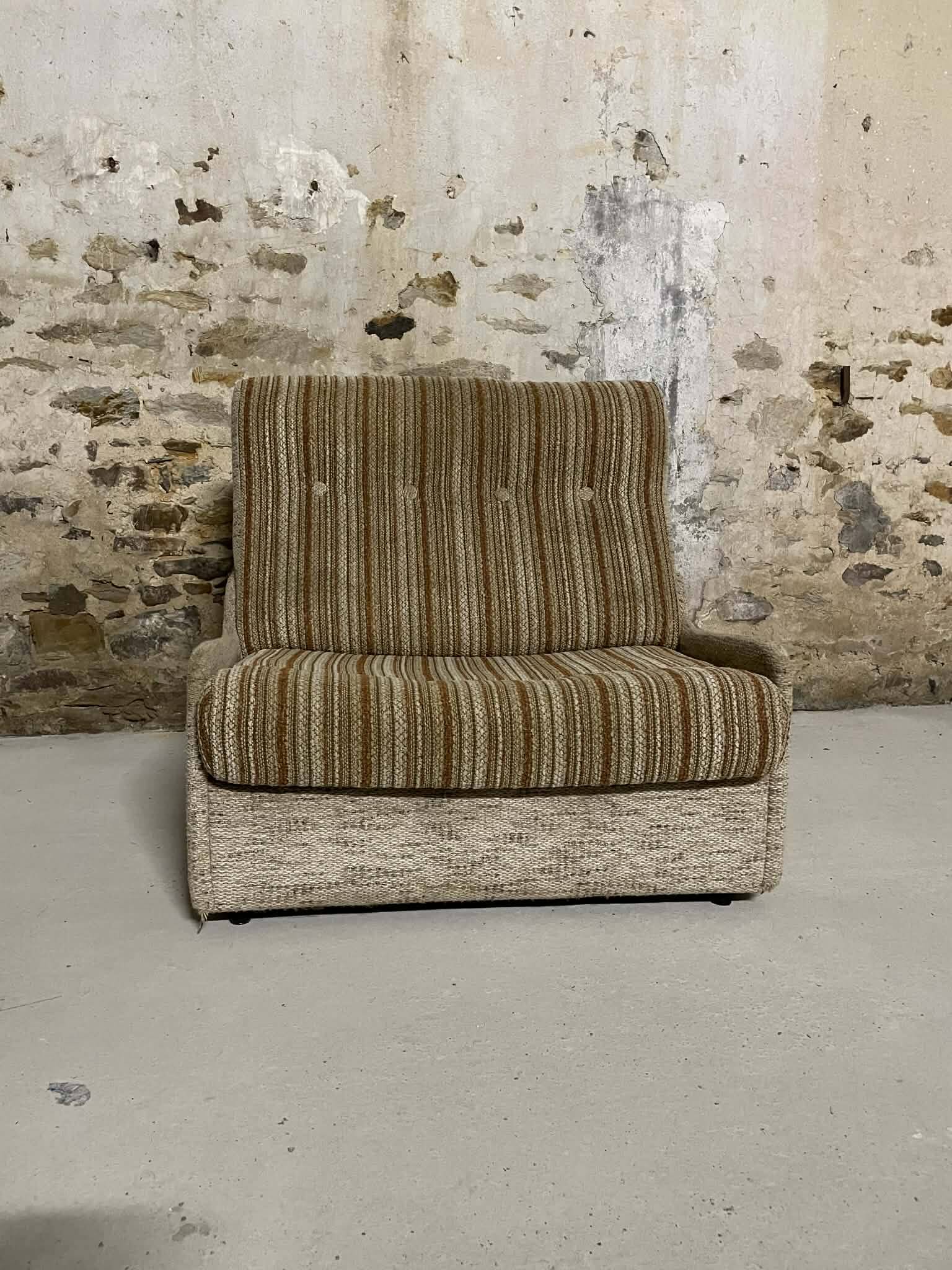 Vintage convertible armchair into a guest bed.