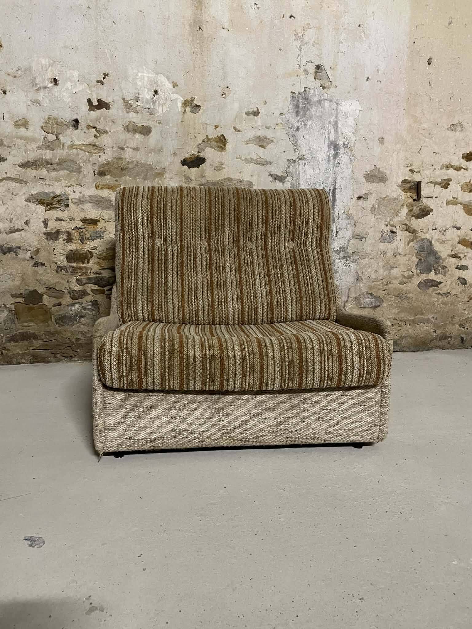 Vintage convertible armchair into a guest bed