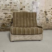 Vintage convertible armchair into a guest bed
