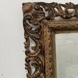 Napoleon III style mirror in carved wood, 20th century.