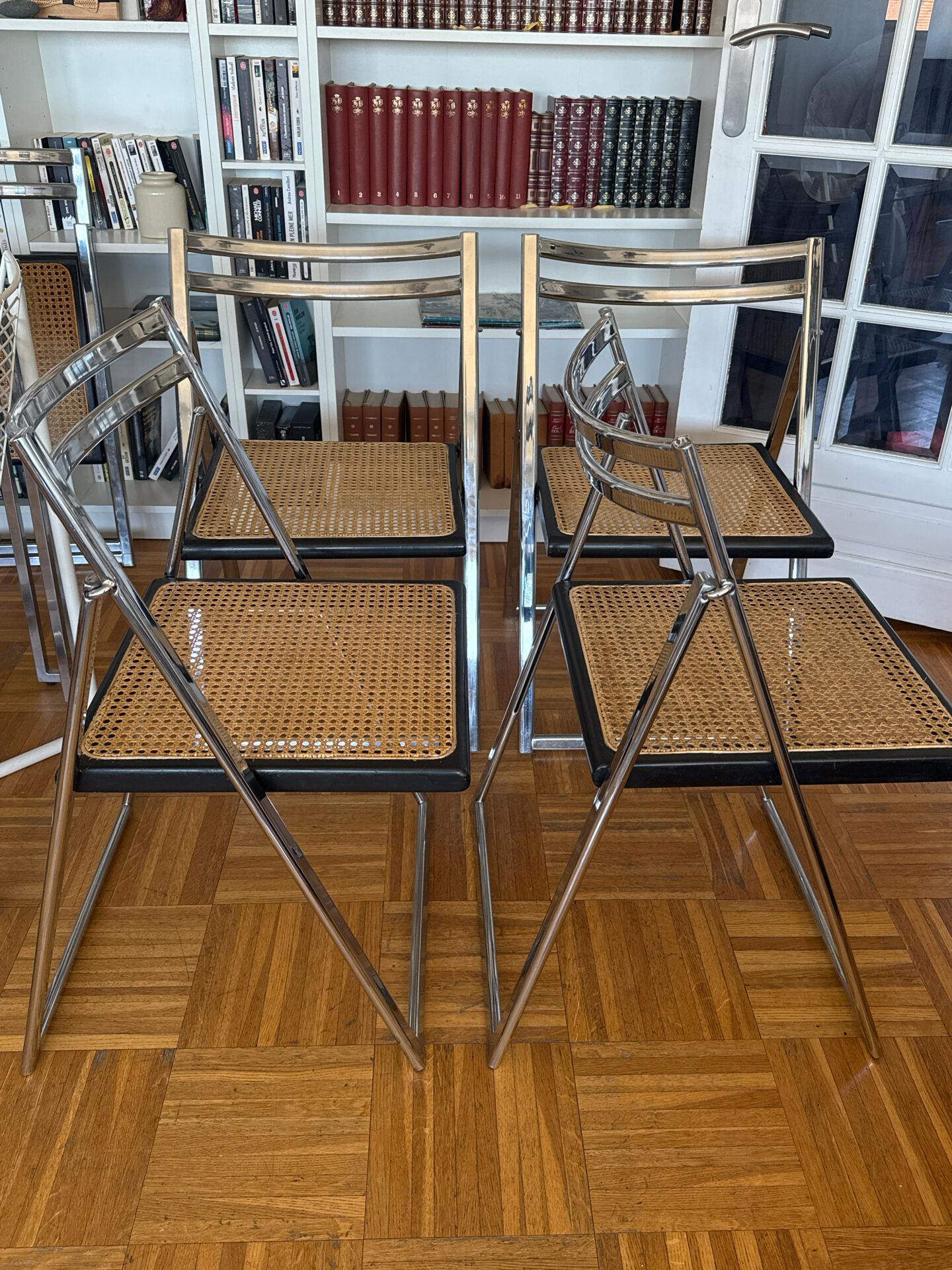 Set of 4 Italian folding chairs with caning.