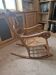 Oak rocking chair with a straw seat.