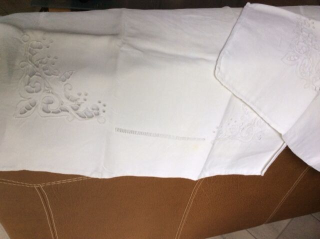 Set of 16 antique hand-embroidered stainedcases