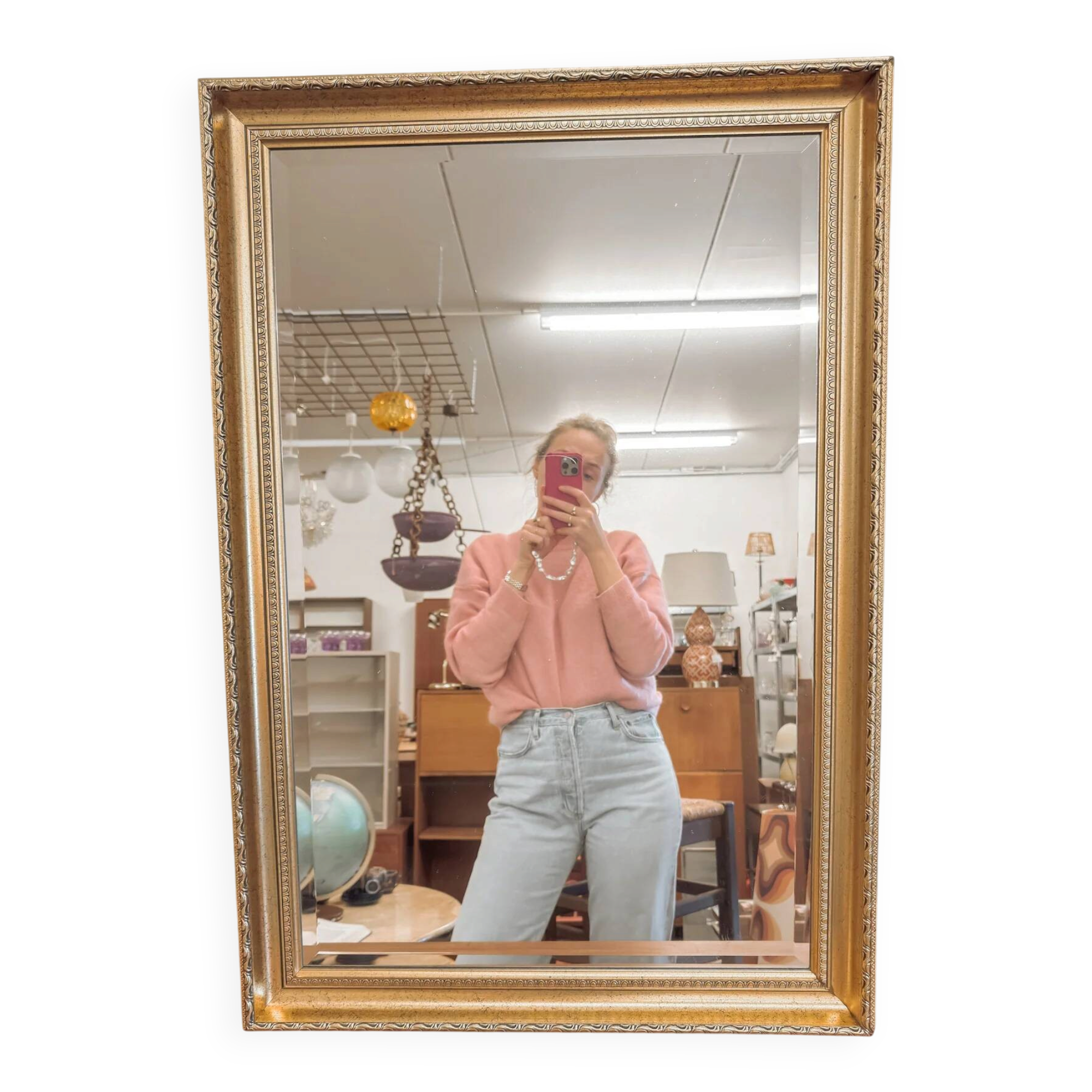 XL vintage bevelled mirror with a gold frame.