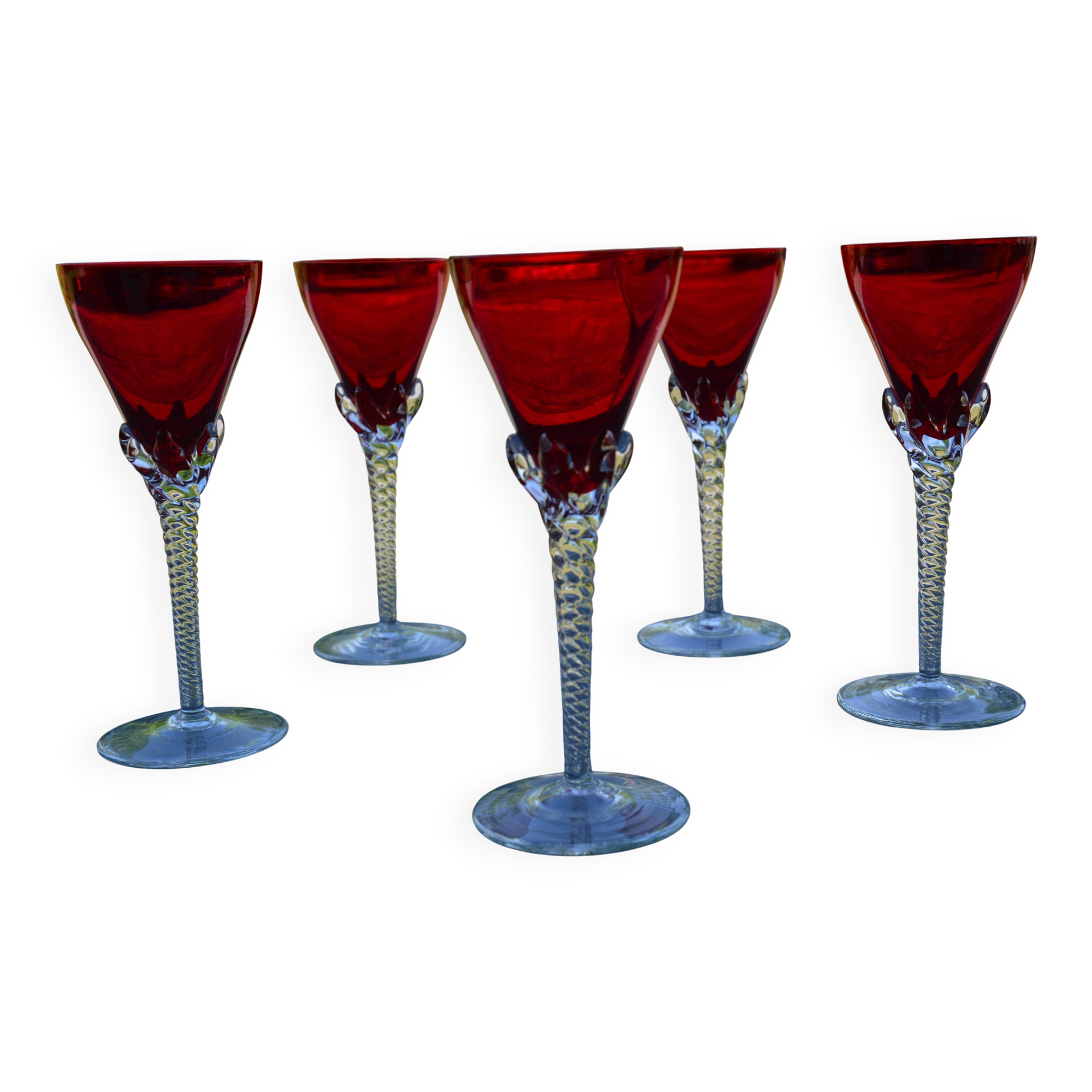 5 red crystal glasses with twisted stems