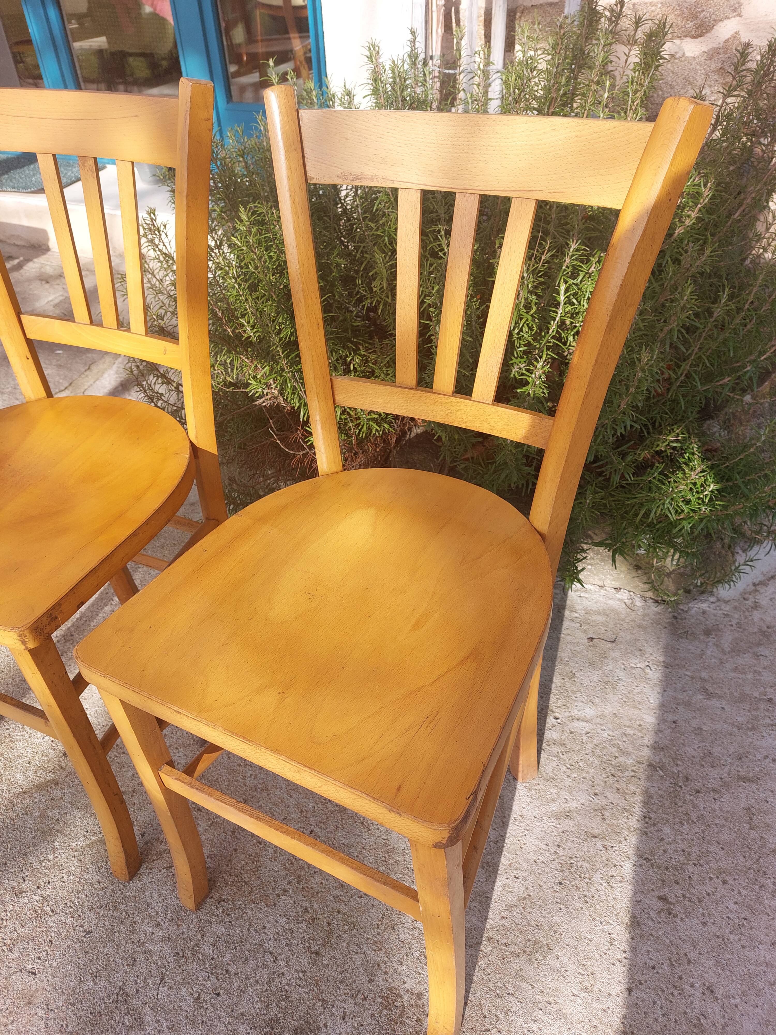 pair of Luterma style bistro chairs