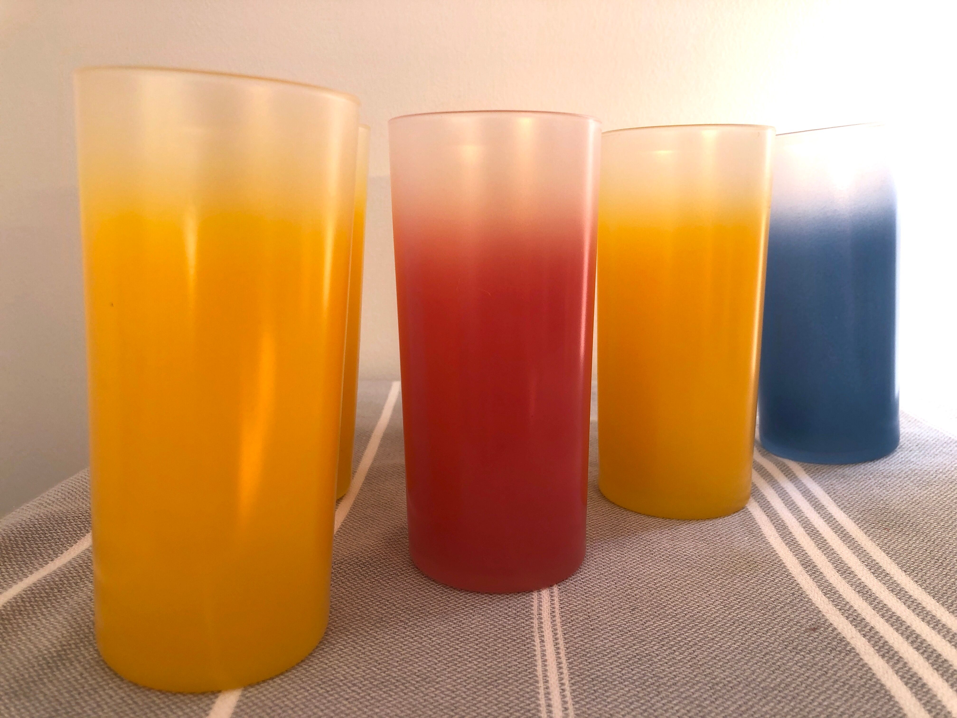 Yellow, red and frosted yellow orangeade glasses made of vintage glass