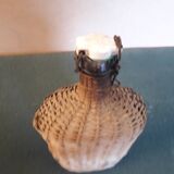 Set of two glass and wicker bottles