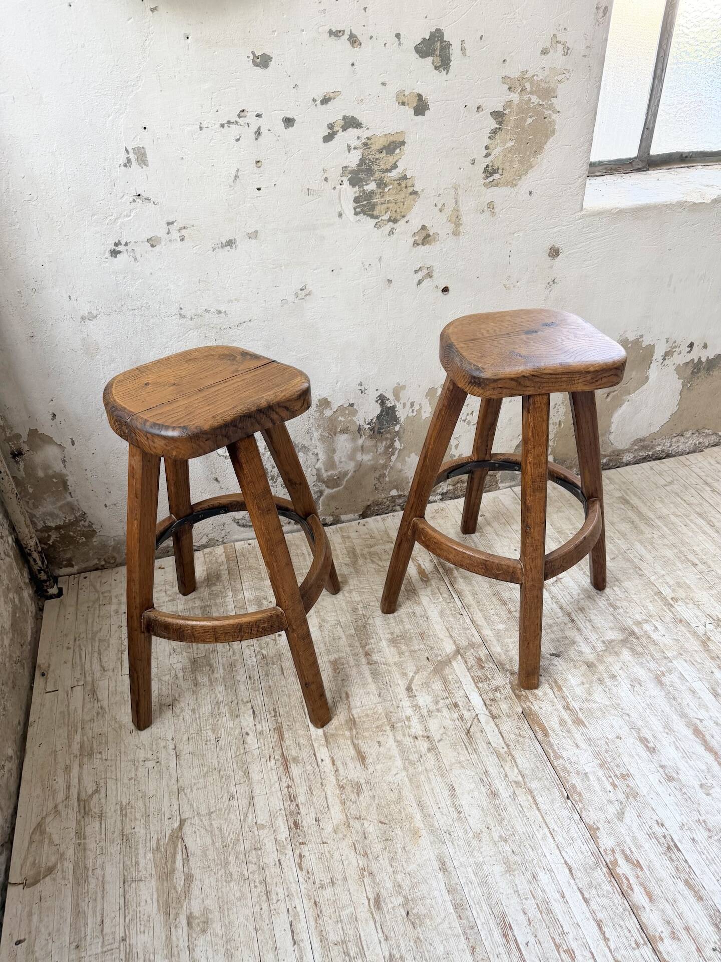 Pair of Henri Bataille stools in oak