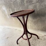 Pedestal table in curved wood