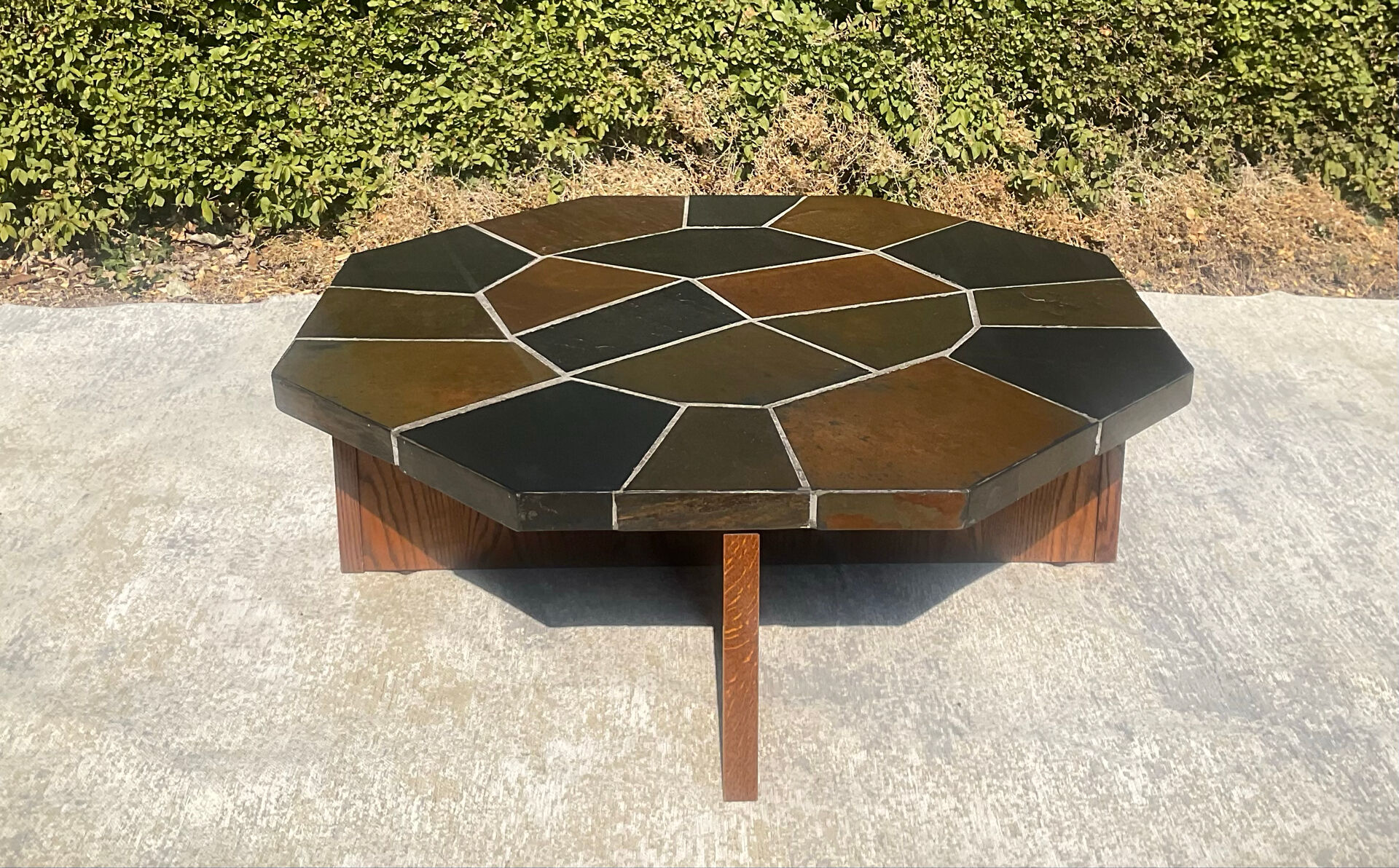 Brutalist octagonal coffee table from the 1970s in solid oak and slate.