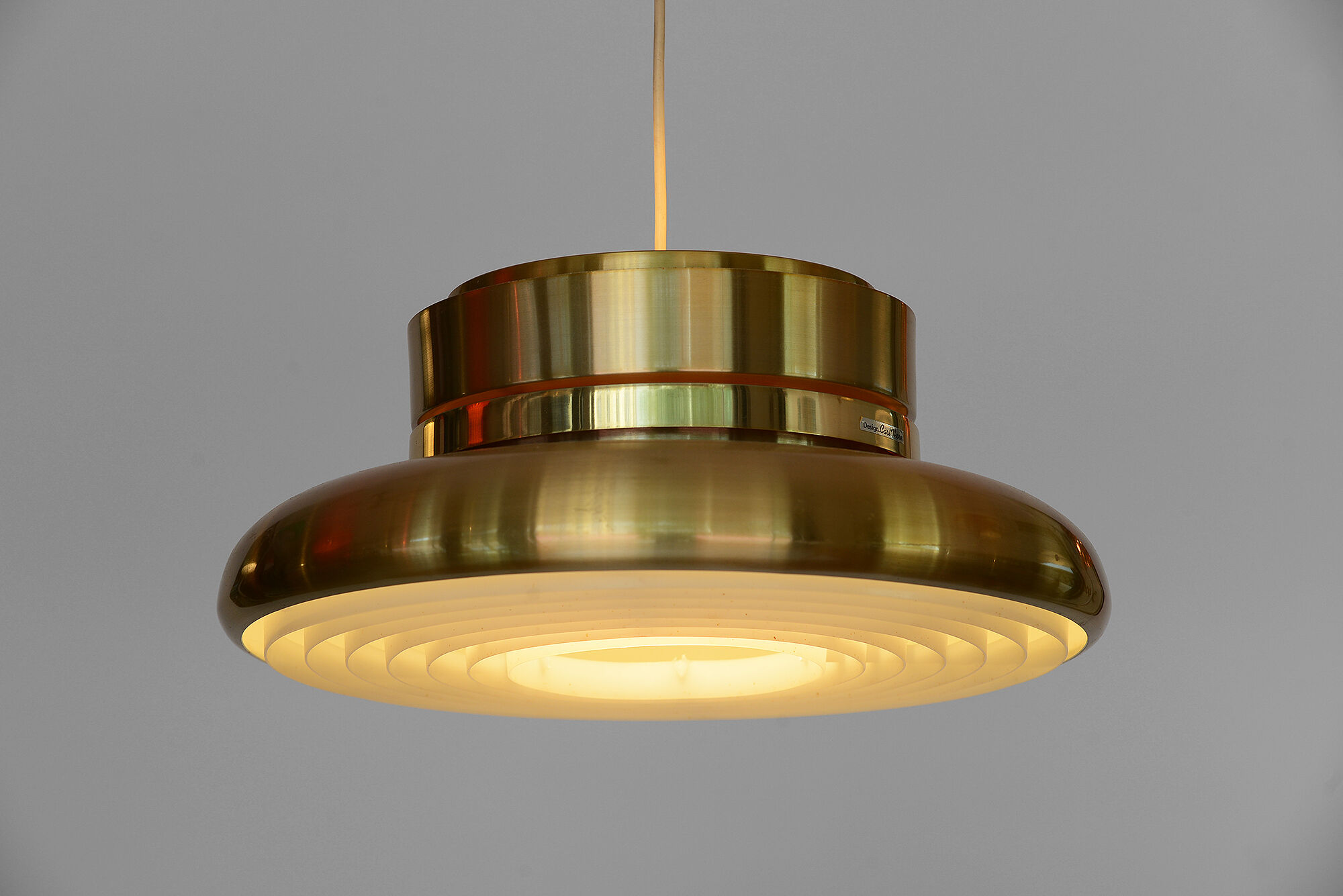 Gold coloured aluminium hanging light by Carl-Thore for Granhaga.