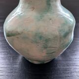 Green and white signed vase