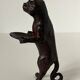 Pockets in the shape of a servant cat in bronze of reddish-brown patina