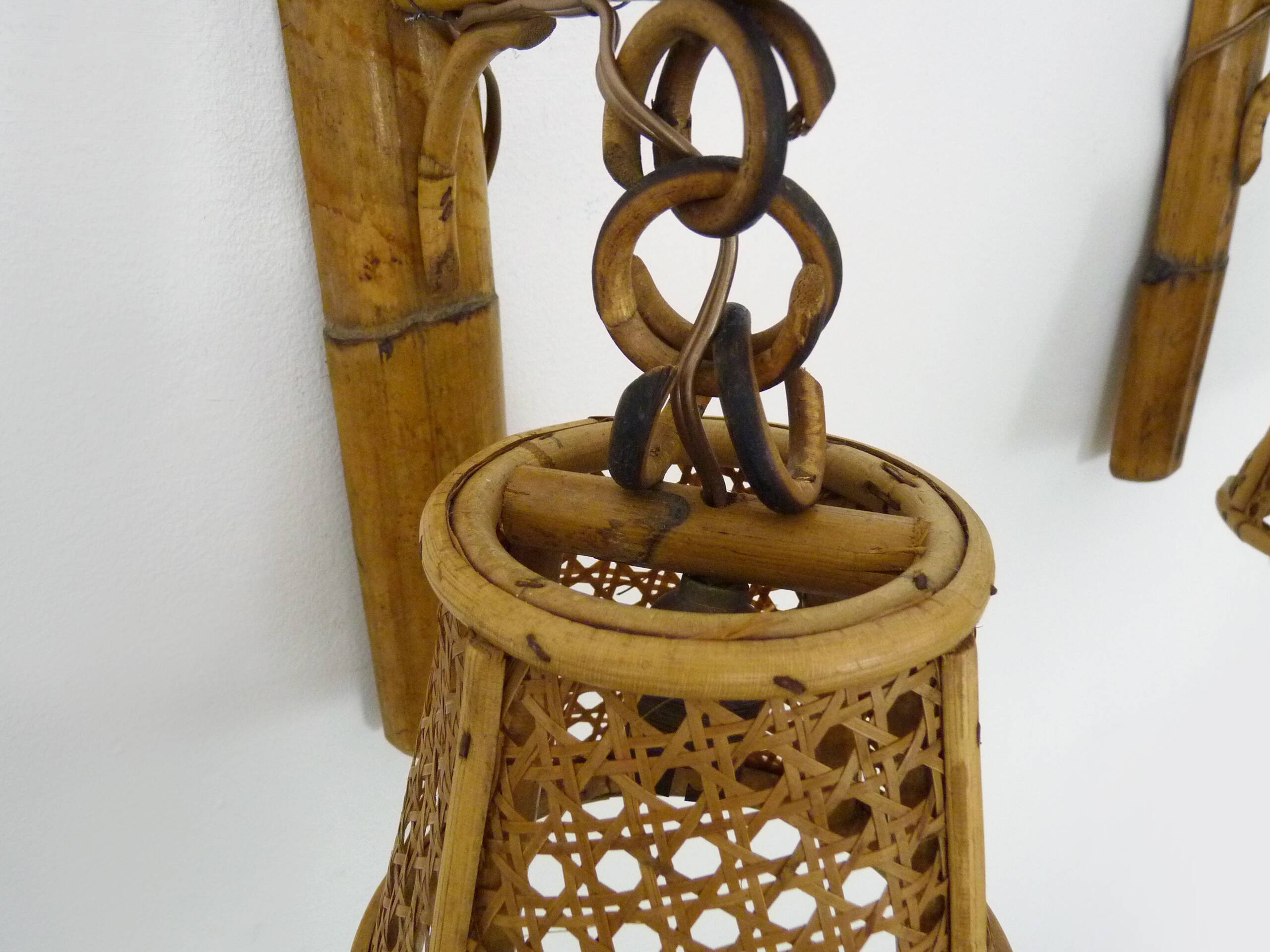 Pair of rattan and cane lantern wall lights. 1950s-60s