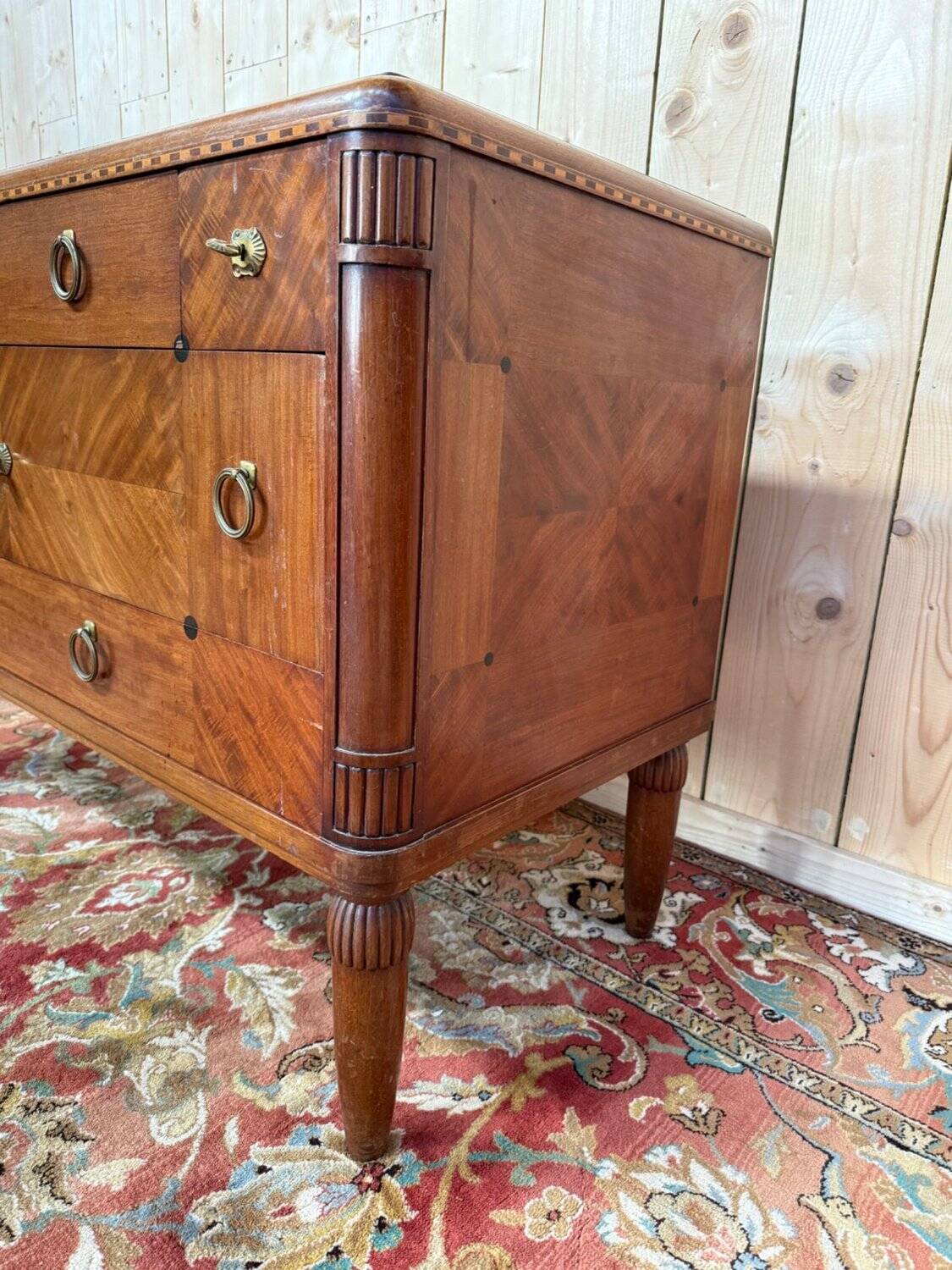 Art Deco walnut and black marble commode from the 1960s.